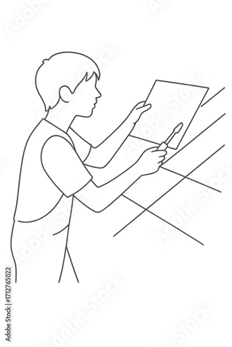 Boy helping with roof repair while holding a sheet of material  