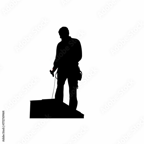 Silhouette of a construction worker welding a roof joint isolated on white background