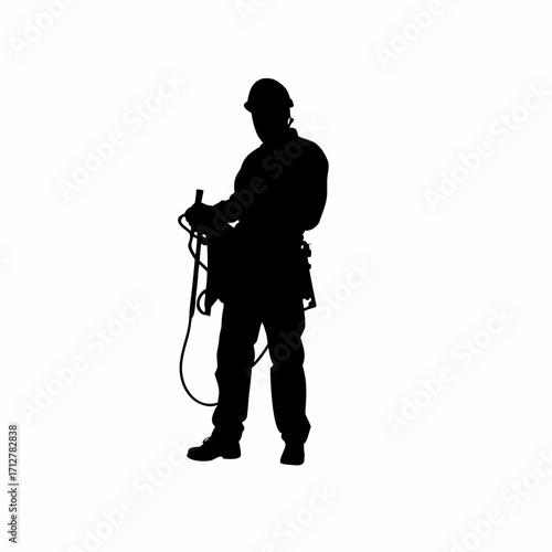 Silhouette of tbm operator connecting electric cables to boring machine isolated on white background