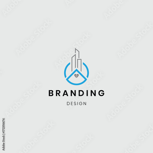A logo showing a house with buildings, symbolizing real estate, construction, and property development. Suitable for architecture firms, real estate agencies, home builders, and construction businesse