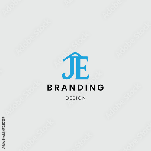 A logo combining a house and flat buildings with the initials “JE”, symbolizing real estate, property development, and modern living. Perfect for real estate agencies, housing projects, apartment comp