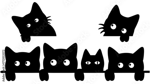 Playful black kittens peek curiously over a ledge, bringing charm to any project.