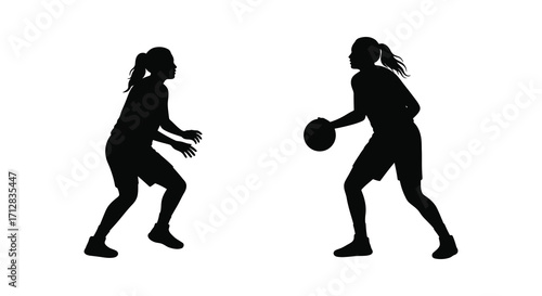 Two female silhouettes engaged in a dynamic basketball game motion