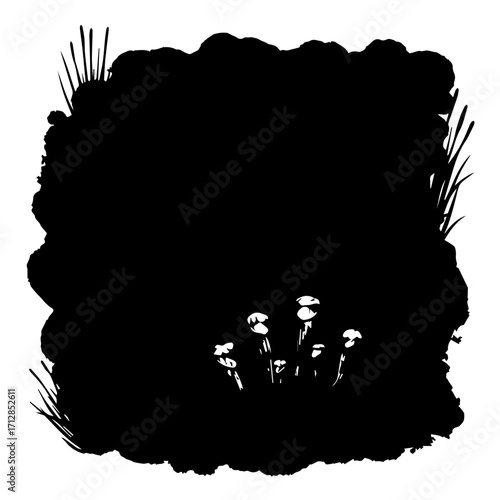 Silhouette of Mushrooms Growing in Dark Soil with Surrounding Grass Blades.