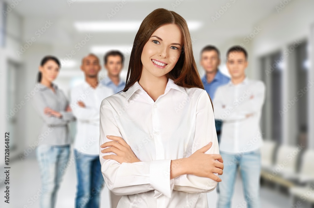 Fototapeta premium Successful Businesswoman Standing with Business Team In Modern Office