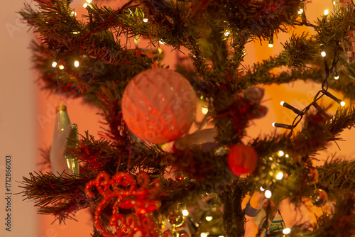 A beautifully decorated Christmas tree featuring colorful ornaments and twinkling lights, perfect for holiday celebrations and festive decorations.