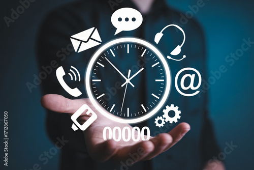 Wallpaper Mural Man presenting time management and communication icons in his hand on a blue background Torontodigital.ca