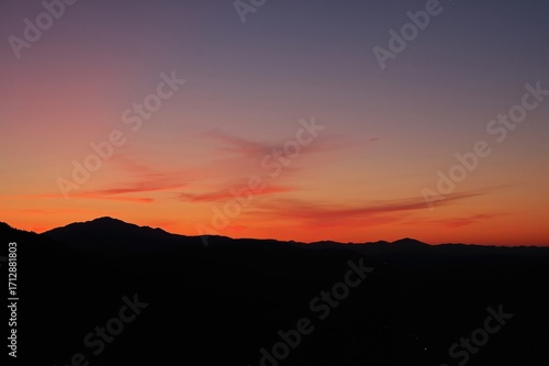 Wallpaper Mural Peaceful Evening Outline Against Vibrant Hills Torontodigital.ca