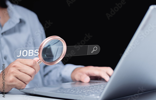 Job search concept. Hiring Human Resources. unemployment finding job search for resume register job interview, find your career. Person use laptop with search bar for find jobs on virtual screen
