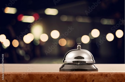 Fotografía Steel concierge bell on cozy hotel lounge