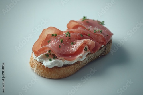 Grilled bread topped with c...