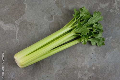 Fresh celery stalks placed ...