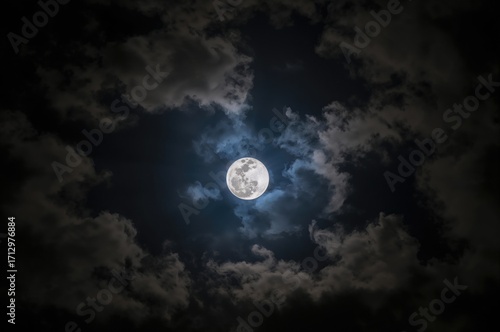 A giant bright moon glows b...