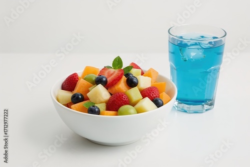 Present a bowl of mixed fru...