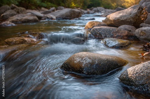 Rocks Amidst Moving Water