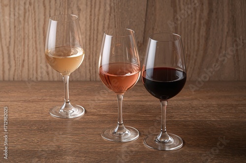 Trio of wine glasses filled...