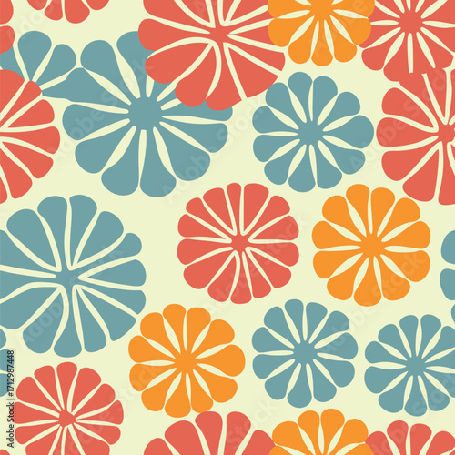 A seamless repeating pattern of stylized chrysanthemum flowers in coral, teal, and orange hues on a pale yellow background.