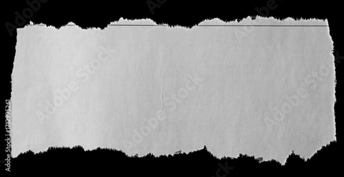 Torn paper on black © Stillfx