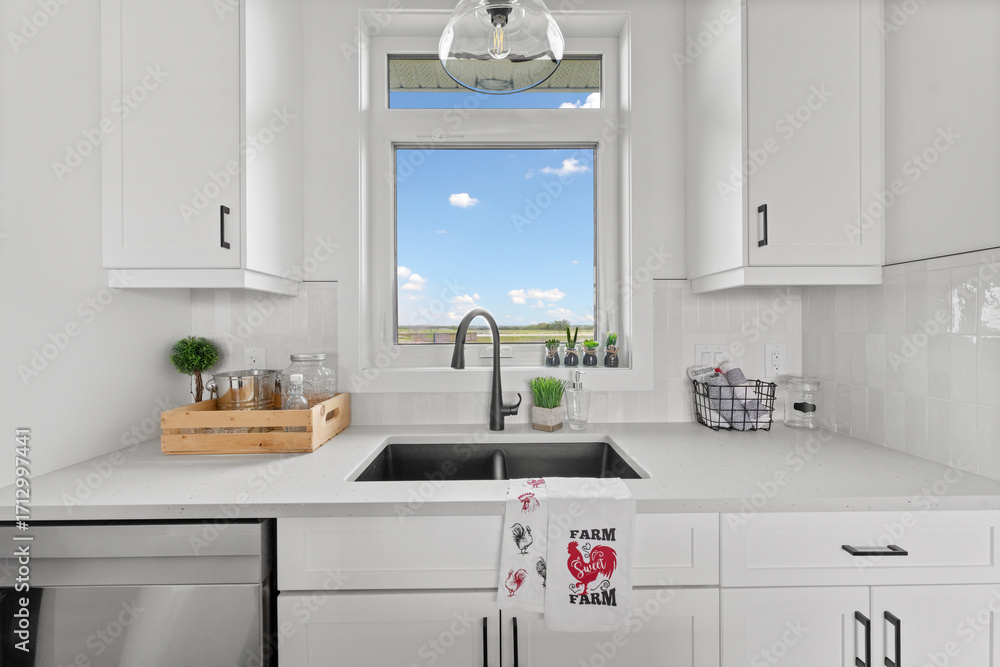 Kitchen with a sink and a window Kitchen with a sink and a window