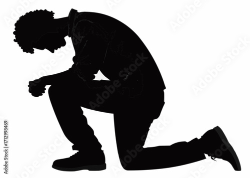 Silhouette of a man kneeling with head bowed and hands clasped in front of him on a white background