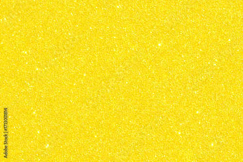 Golden yellow glitter bokeh background. Photo can be used for New Year, Christmas and all celebration concepts.