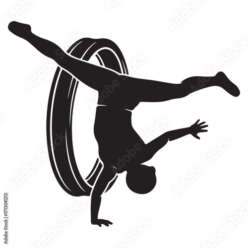 Dynamic Silhouette of an Acrobatic Performer Balancing on One Hand within a Ring