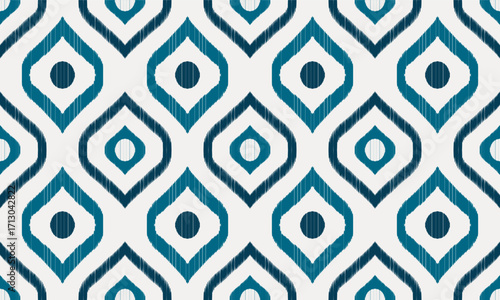 Seamless ethnic Ikat geometric pattern