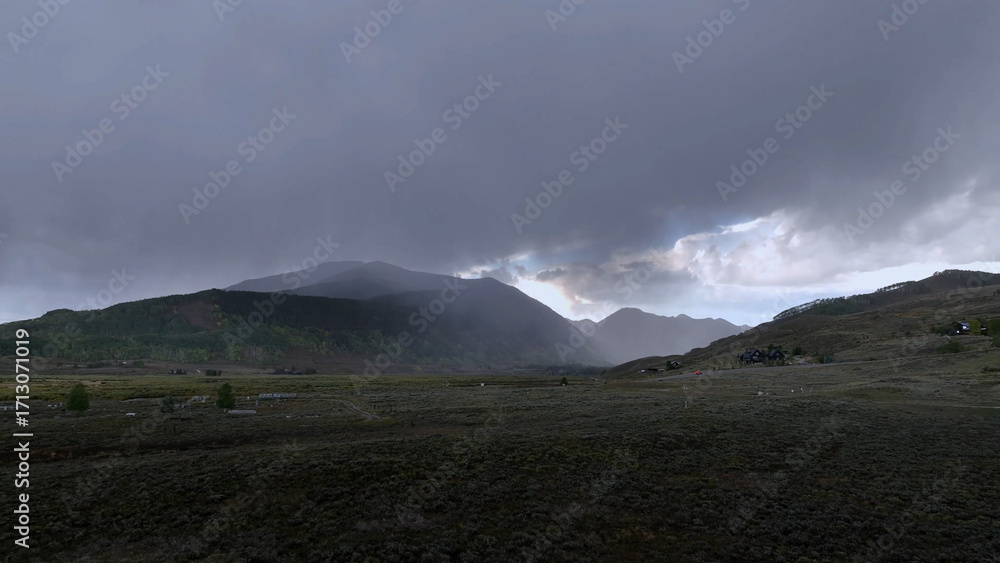 Obraz premium Beautiful drone view over storm clouds mountain landscape