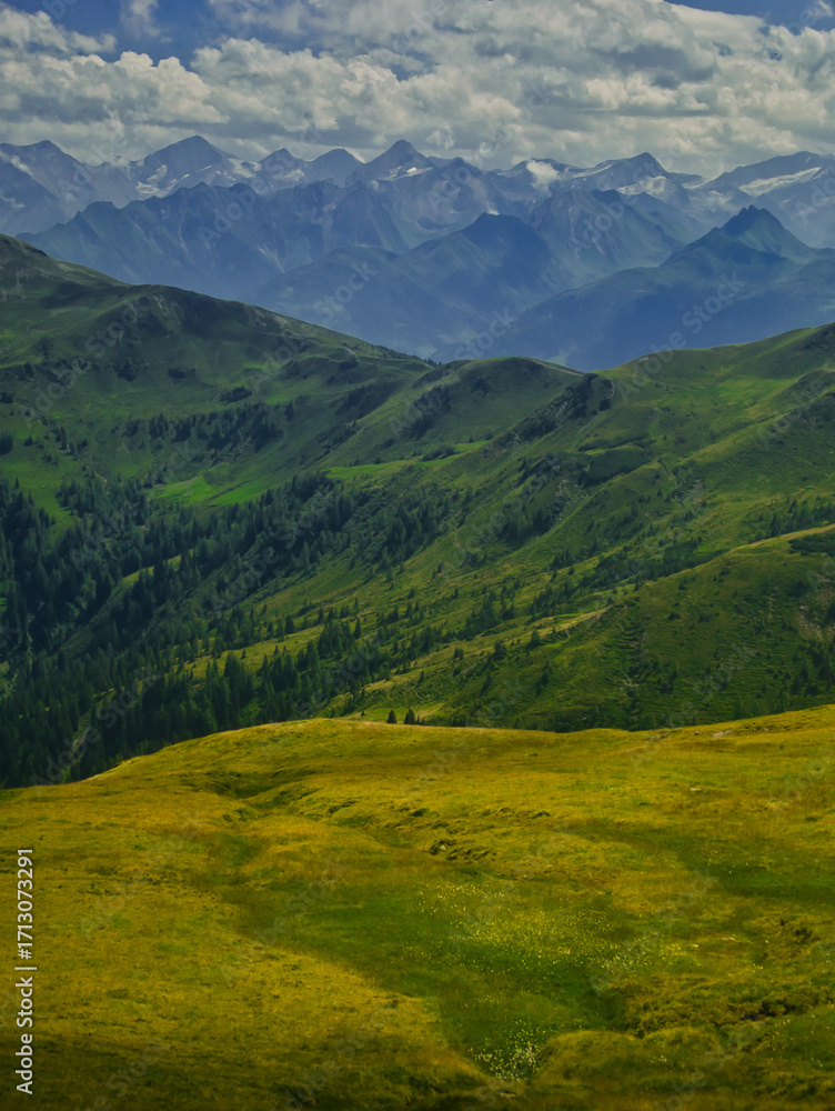 Obraz premium View on High Tauern / Hohen Tauren natural park from mountains near Saalbach Hinterglemm Leogang ski resort during summer day