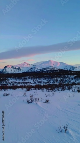 Snowy mountain landscape at dawn (1)