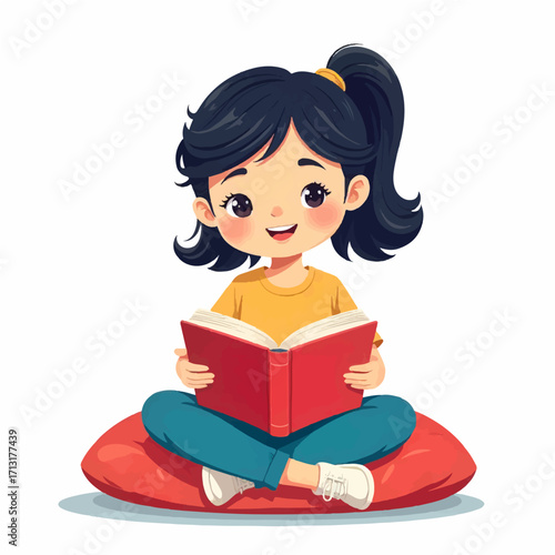 Young girl happily reading a book while sitting on a pillow, enjoying story time