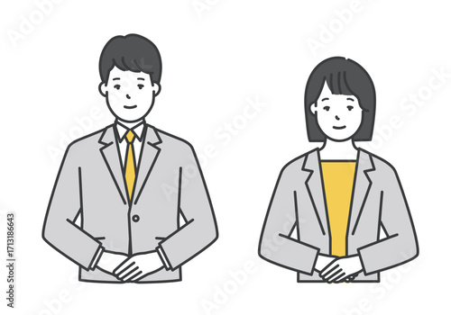 笑顔でポーズをとる男女ビジネスパーソン