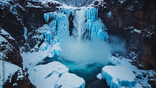 Waterfall in winter canyon