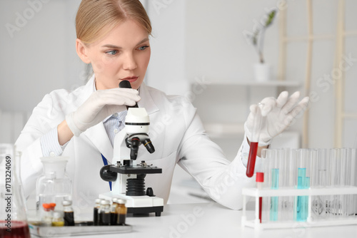 Female scientist with micro...