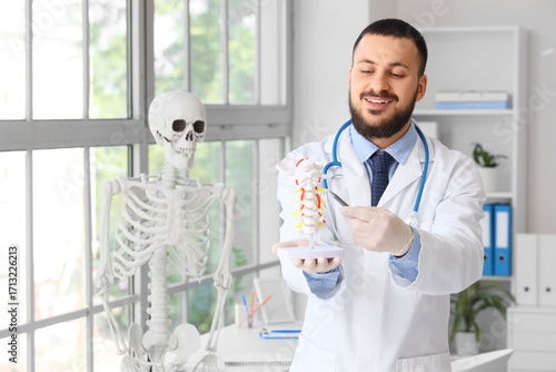 Smiling doctor explaining s...