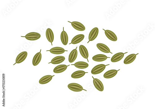 Scattered pile of green cardamom seeds with light and dark green tones