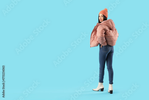 Young woman in stylish puff...