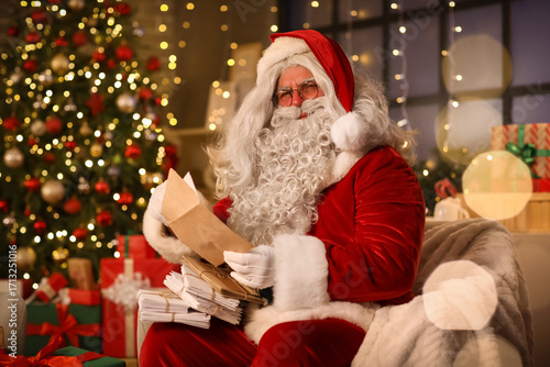 Santa Claus with letter in ...