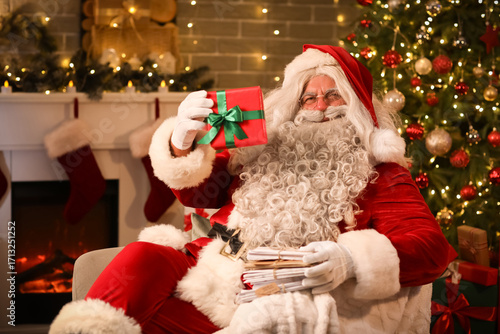 Santa Claus with gift and l...