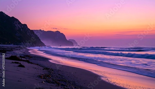 A tranquil beach scene at sunrise, with dramatic purple and pink hues painting the sky and waves.