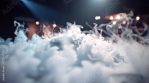 Fog spilling from dry ice in a dimly lit atmosphere  