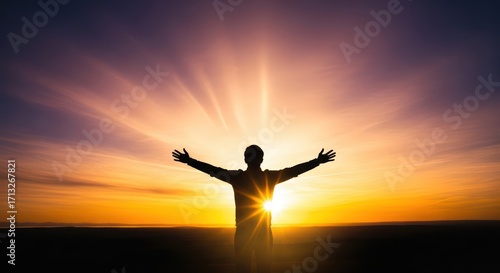 Wallpaper Mural Silhouette with Open Arms Embracing the Sunrise: A Symbol of Hope and Aspiration Torontodigital.ca