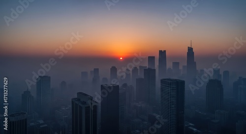 Wallpaper Mural Urban sunrise shrouded in mist, silhouetted cityscape awakens with a hazy dawn glow emphasizing Torontodigital.ca