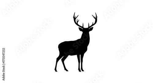 Silhouette of a majestic stag with large antlers, an emblem of the wild and natural world
