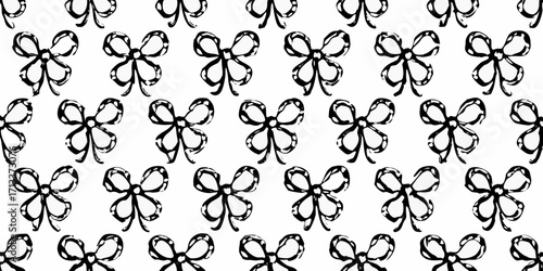 Hand drawn black bows seamless pattern on white background