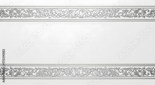 Elegant white wall with decorative silver floral border design, classic style.