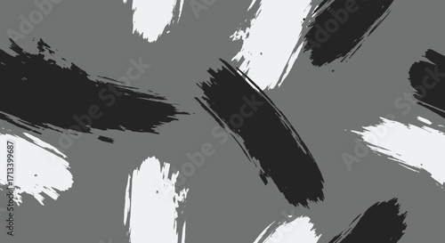 Abstract expressive brush strokes in monochrome tones create a dynamic and artistic pattern. 