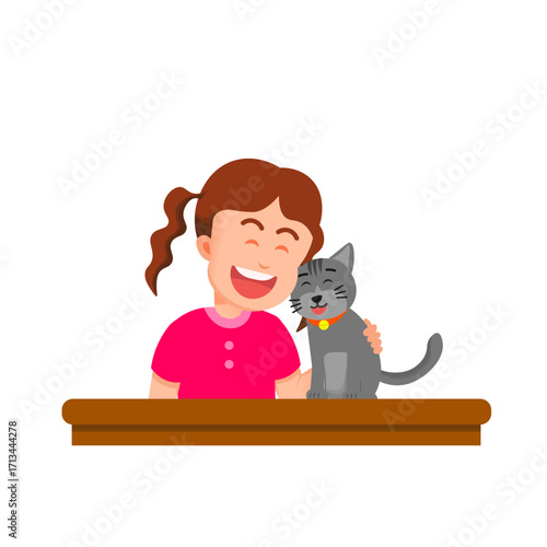 A little girl smiling while hugging her cat