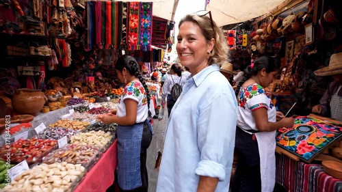 Tourist exploring colorful stalls Mexico City market cinematic handheld cultural travel lifestyle stock video. sightseer discovering vibrant booth mexican capital bazaar artistic