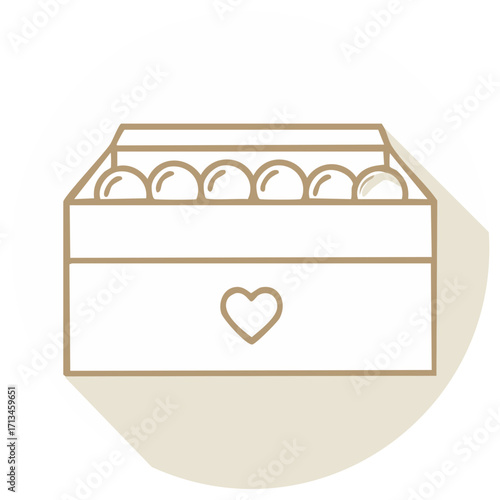 Delicate box with spherical contents and a heart symbol in golden outline design on a beige round base.
